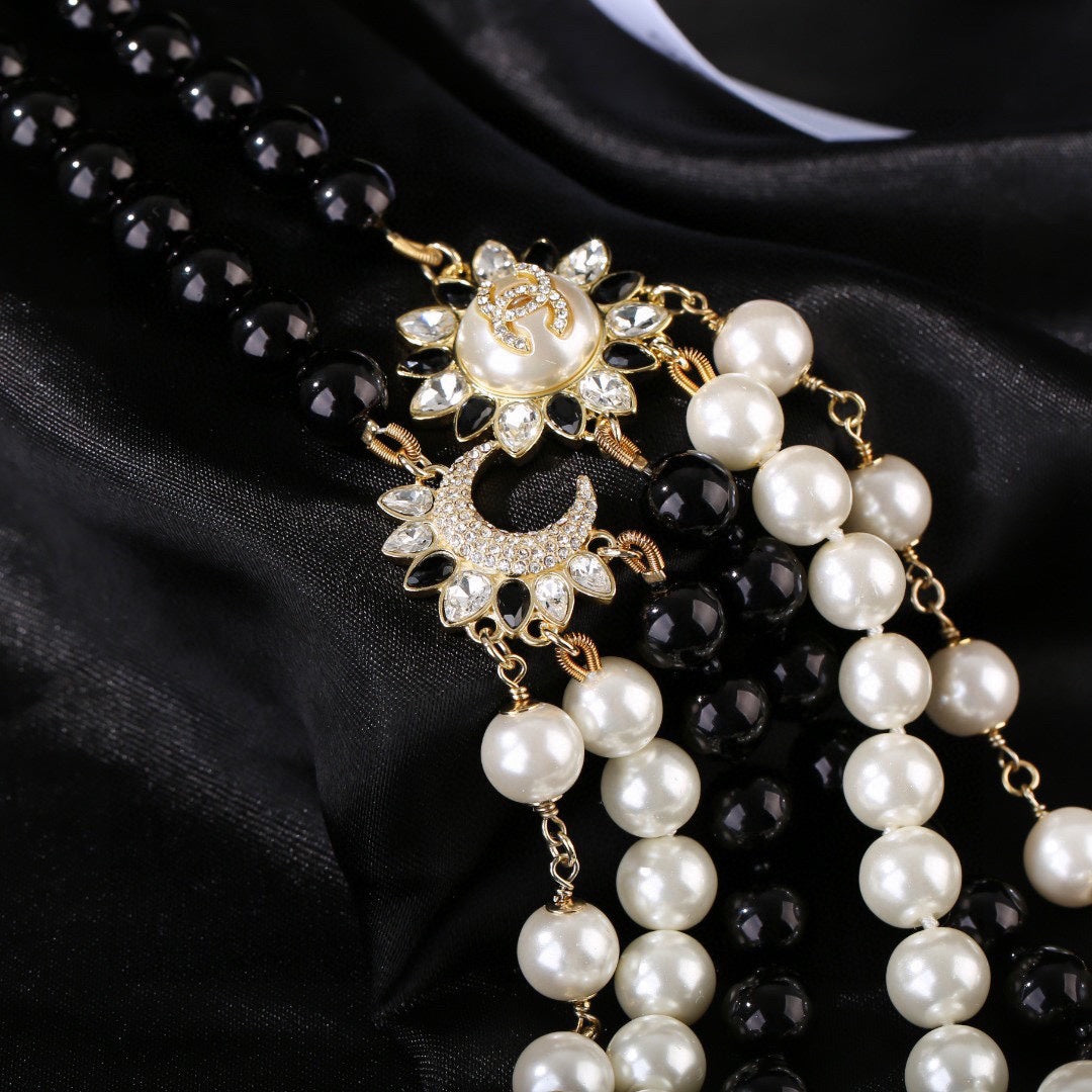 CHANEL 25S CHAIN BELT IN WHITE AND BLACK PEARL 614477