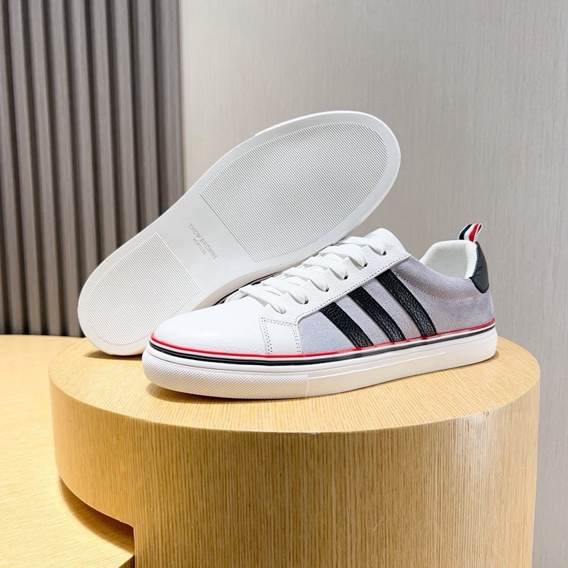 Three-Stripe Color-Block Sneaker — Red & Black Sole Detail