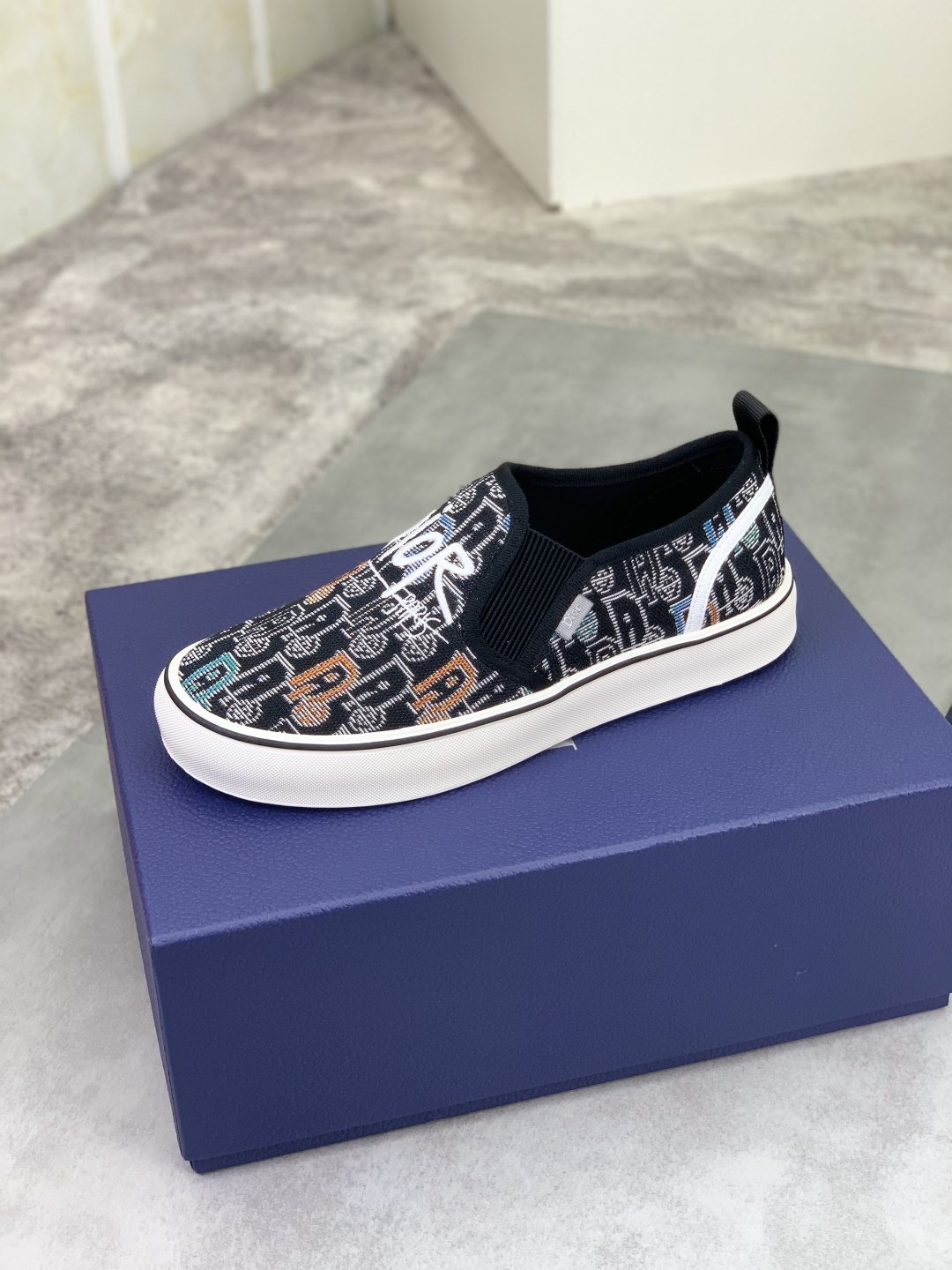 Dior Graphic Canvas Slip-On Sneakers - Black, White and Tan