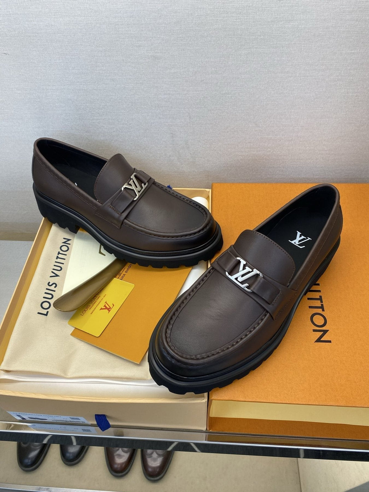 Louis Vuitton Men's Metal Logo Loafers